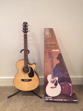 Brand new electro acoustic guitar with box