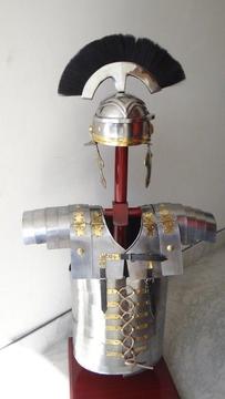 Set of steel and bronze roman body armour, including helmet and padding to be worn underneath