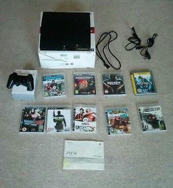 Playstation 3 very good condition perfect working order complete with 9 GAMES and instructions