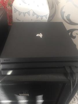PS4 Pro with 20 games, 2 controllers and accessories