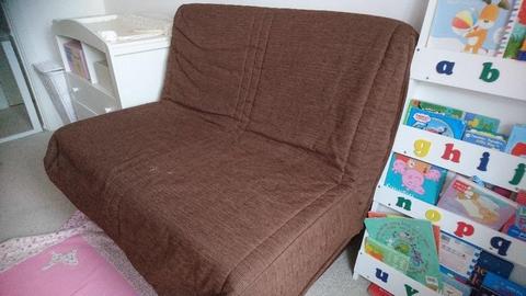 Sofa bed with brown cover, changes back and forth in seconds