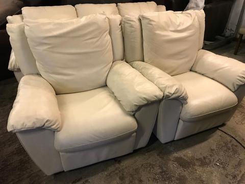 As new stunning Italian leather 3 seater and 2 recliner chairs
