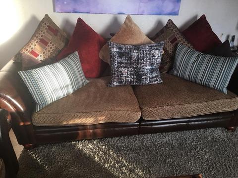 Brown leather and fabric sofa