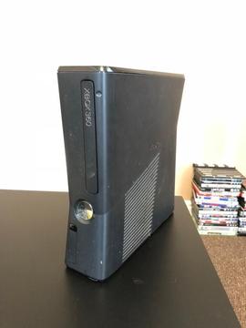 Xbox 360 slim with 7 games and 2 controllers
