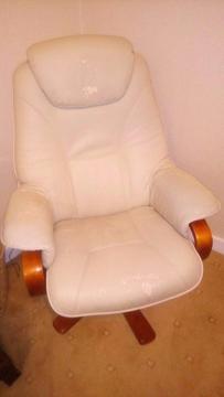 Arm chair and footstool free to collect. Comfortable, reclining and swivels