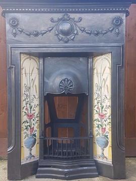 Restored original cast iron tiled fireplace