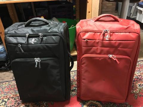 Two medium sized soft shell suitcases. Very light and robust. Atlantica Brand