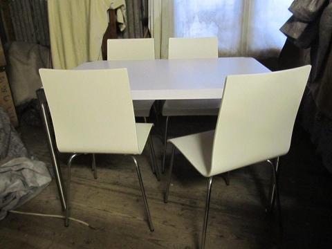 New modern white and chrome 4 chair dining set