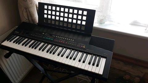 Yamaha PSR-215 keyboard with stand