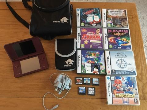 Nintendo DSi XL with 13 Games. Including 3 Mario games and Cars 2
