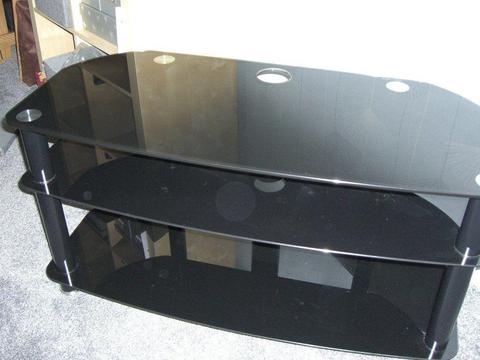 Black glass TV stand in very good condition