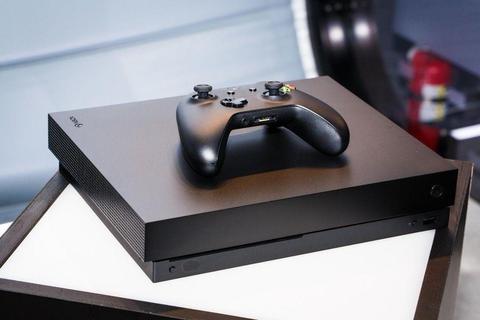 Xbox One X Console with Games and Vertical stand! (Less than one month old)