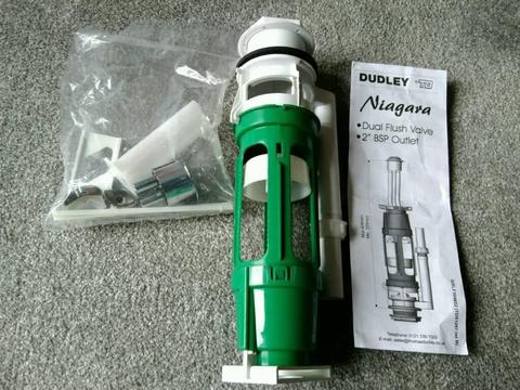 Dudley Niagra mechanical dual flush flushing valve. New in box