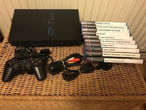 PlayStation 2 console and young kids games. Ps2