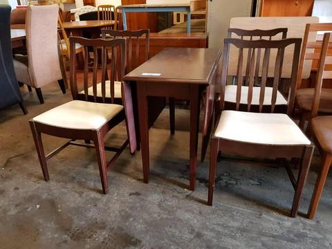 Stag drop leaf table with four chairs