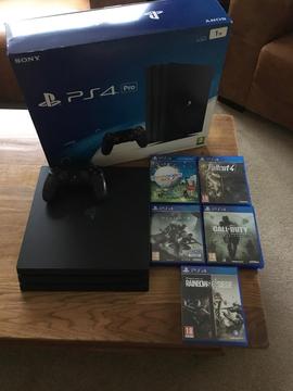 PS4 Pro 1TB with 5 games boxed as new unwanted Christmas present