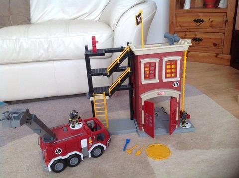 Fisher Price Fire station and fire engine with sirens and flashing lights
