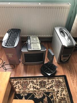 Computer, two keyboards and two towers