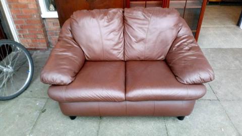 Real leather sofa in brown