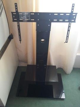 Black glossy TV stand with shelves