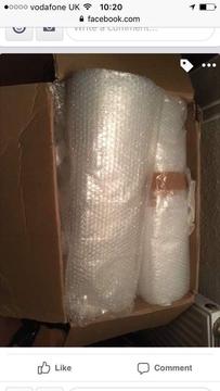 Box of packing material and bubble wrap