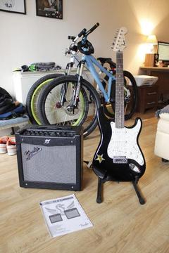 Fender Mustang I (V.2) amp and Squier Stratocaster by Fender electric guitar