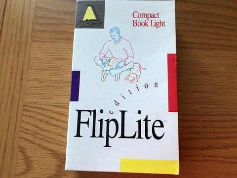 Flip light. Compact book light. Brand new. Includes batteries