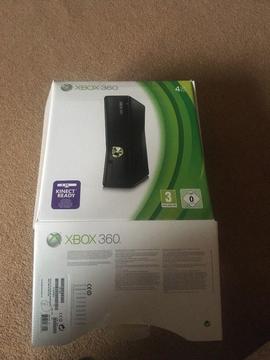 Xbox 360 with controller and game - practically brand new! Still in box!