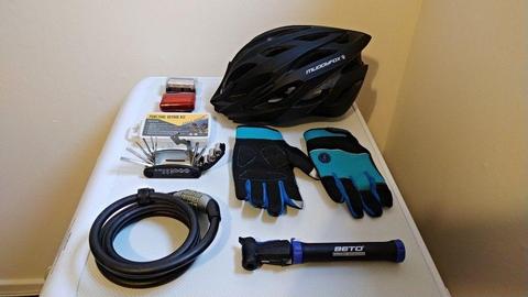 Bike accessories: helmet, gloves, lock, pump, puncture repair kit, set of tools, lights