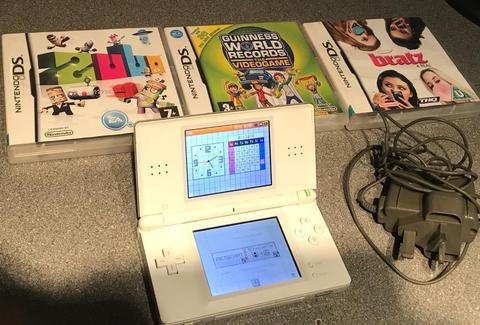 Nintendo DSLite console , Charger and Games