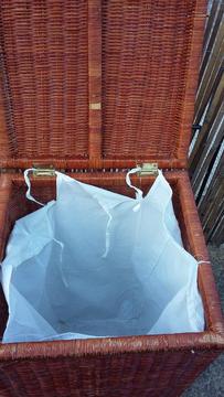 brown wicker laundry basket with lid attached