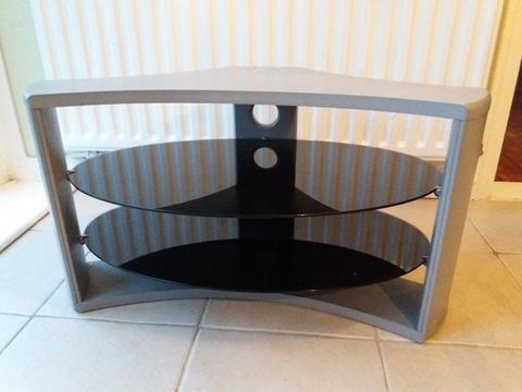 Silver TV stand with 2 glass shelves