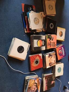 400 singles records plus some picture discs - all in sleeves