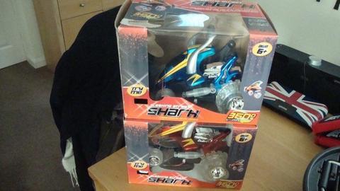 2 remote control cars as pictured new and boxed