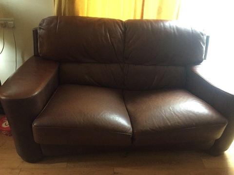 Brown leather sofa £15 with two free brown leather poffees and two cushions