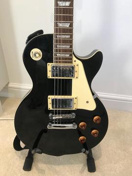 Epiphone Les Paul Guitar and Peavey Rage amp