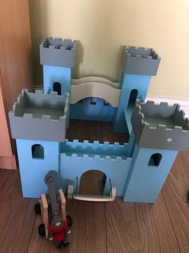 Knight’s blue castle with knight and cannon