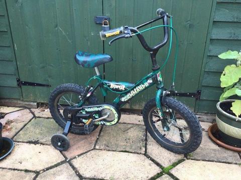 Young boys bike, green age 3-6 years with stabilisers