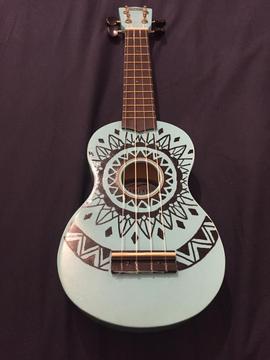 Cute quirky turquoise ukulele