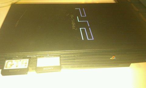 playstation 2 with 6 games