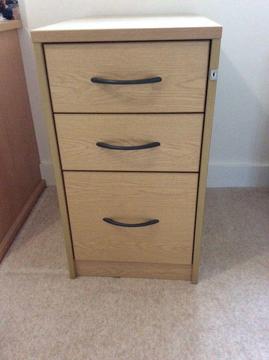Light oak filing cabinet 1 A4size filing drawer, plus 2 other drawers