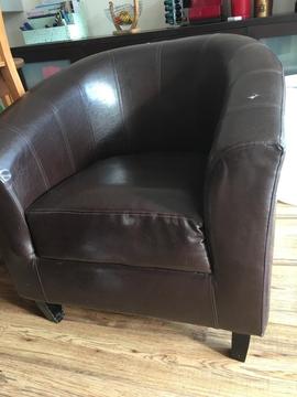 Brown leather bucket chair
