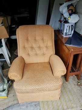 Single armchair with foot rest lever