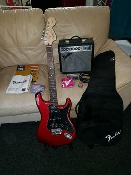 Fender squire Strat in candy apple red with all accessories, needs power lead for amp