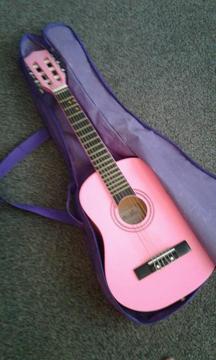 Pink 3/4 size accoustic guitar