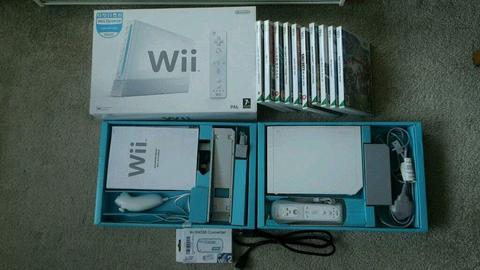 Boxed Nintendo Wii console with 10 games