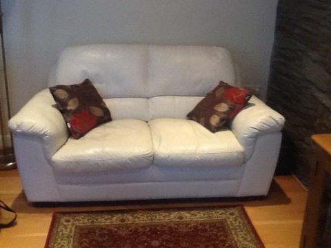 Cream leather 2 seater sofa and armchair in very good condition