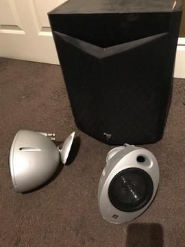 Subwoofer and five Kef surround speakers