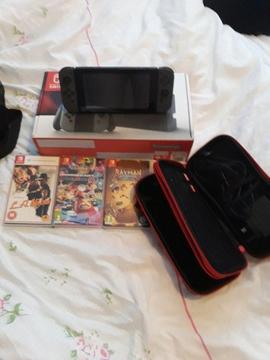 Nintendo switch 200gb sd card case and 3 games
