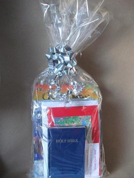 Basket with christian items for kids and adults